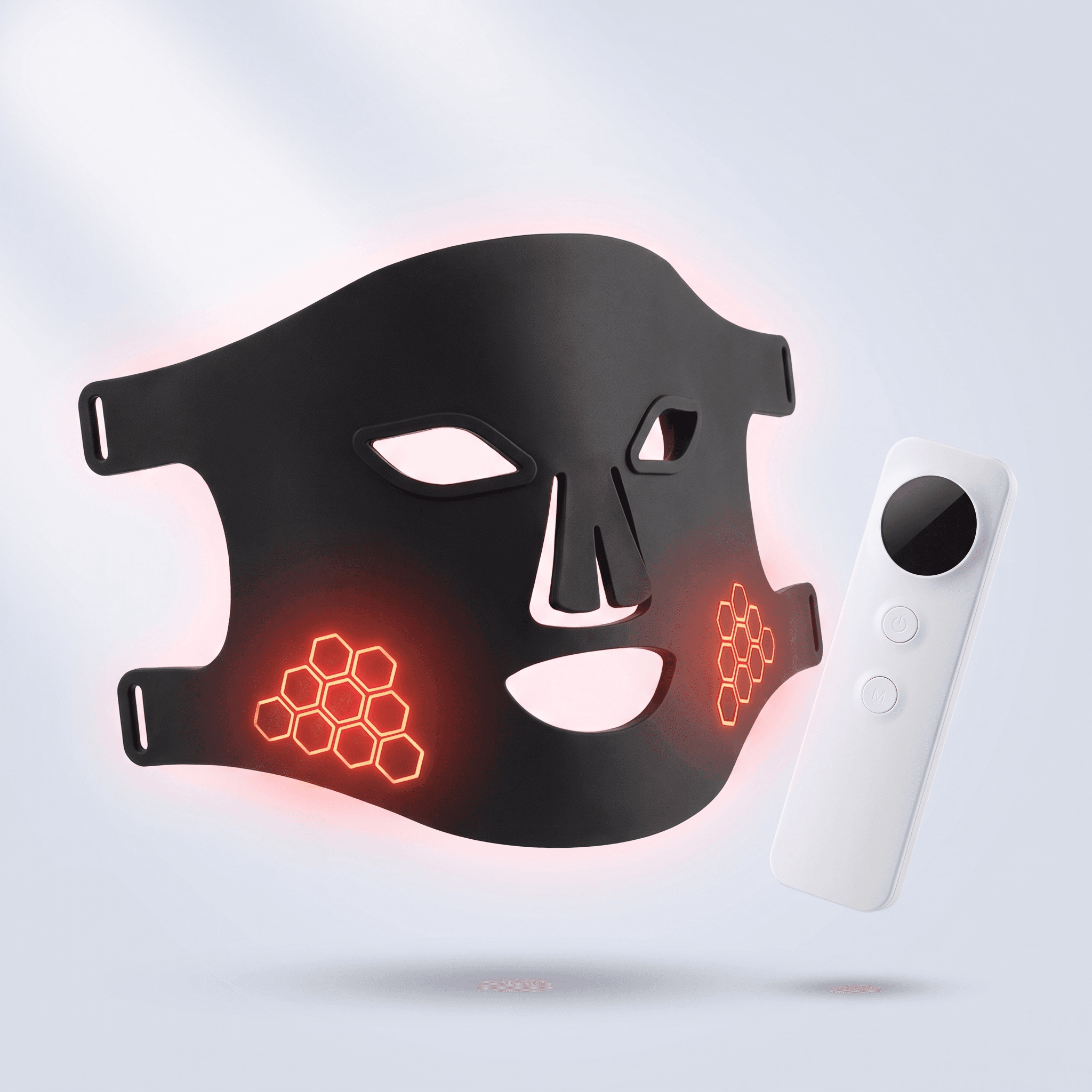The Firelight LED Mask in flexible black silicone, shown with its controller
